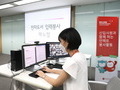 롯데정보통신, 시각장애인 위한 점자도서 봉사활동 벌여